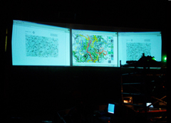 Souncities performance by Stanza. The project is available for exhibition, workshops and live performance. During the performance I operate the soundcities applications and stanza websites on three laptops these generate sound control data and image data. These machine are connected to a mixing desk. Images are coming from the website projects. This is basically a live world tour of city sounds as music. 